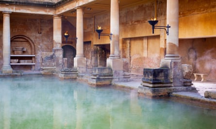 Steam rising off the hot mineral water in the Great Bath, part of the Roman Baths in Bath, UK