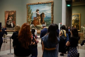 People looking at Portrait of Philip IV on Horseback by Diego Velázquez in the Prado Museum