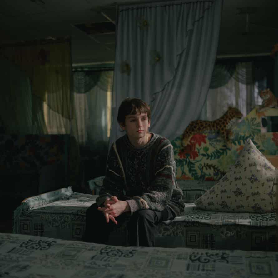 Sasha, 15, in the bedroom of an orphanage in Lviv, 18 March