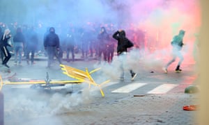 Clashes erupt at a protest in Brussels, Belgium, against Covid-19 measures on 19 December.