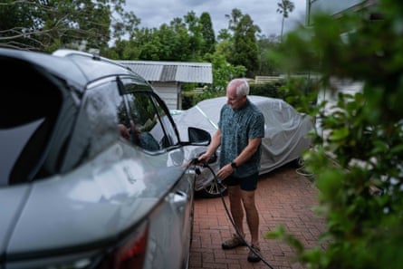 A man charges his BYD car in Sydney.