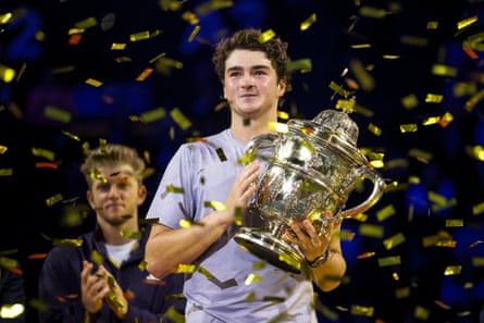 Fonseca poses with the trophy after winning the Swiss Indoors in Basel in October last year