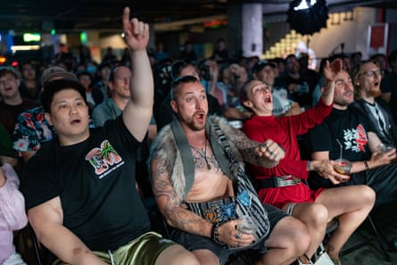 The audience reacts at the ten-year anniversary event for Middle Kingdom Wrestling (MKW) in Beijing on Saturday.