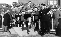 Brian Price leads Wales out against Ireland in 1969.