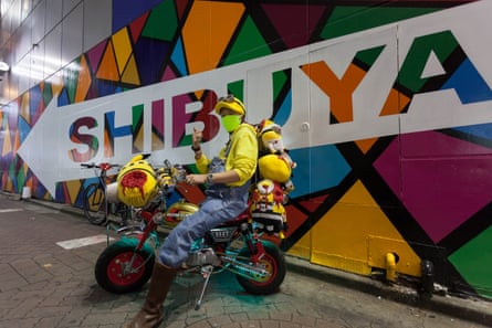A man dressed as a Minion on a motorbike during Halloween celebrations in Shibuya, Tokyo
