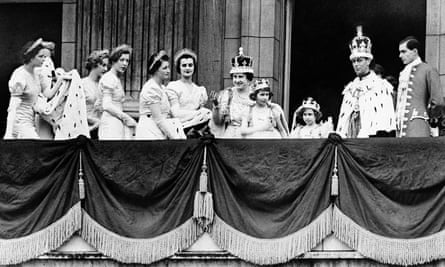 King George VI, second right and Queen Elizabeth, centre, with their daughters, Princess Elizabeth and Princess Margaret on the balcony of Buckingham Palace on 12 May 1937, after the coronation at Westminster Abbey.