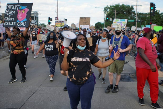 Cori Bush leads a march against the death of George Floyd in June. Bush said in her victory speech: ‘We decided that we the people have the answers, and we will lead from the front lines.’