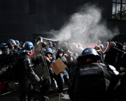 Protesters clashing with French gendarmes in Nantes on Thursday.