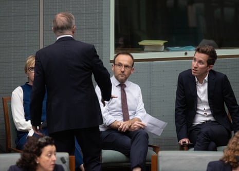 Anthony Albanese chats to the Greens leader, Adam Bandt and Max Chandler-Mather