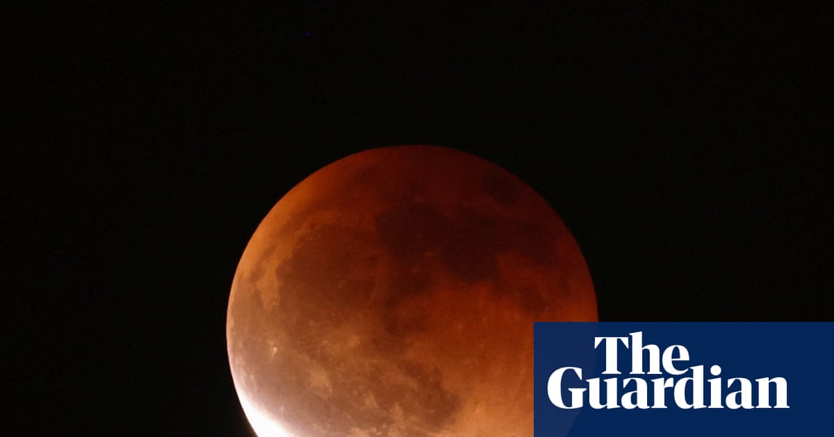 Blood moon and lunar eclipse cast an ethereal light in pictures