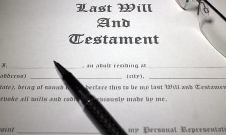 Pen and reading glasses on top of  Last Will and Testament document.