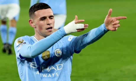 Phil Foden celebrates the second goal of a clinical hat-trick to earn Manchester City victory at Brentford.