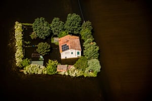 A house surrounded by water