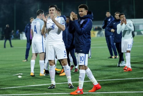 Harry Maguire of England and Dele Alli of England thank and applaud the fans.