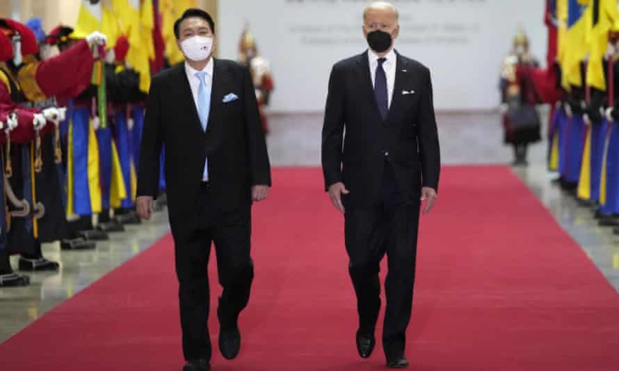 Joe Biden and Yoon Suk-yeol arrive for a state dinner at the National Museum of Korea in Seoul