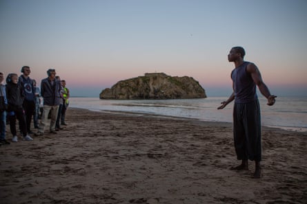 Ebenezer Gyau, right, in Tide Whisperer staged by Kully Thiarai for National Theatre Wales in Tenby, 2018.