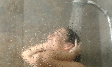 Unfocused portrait of a woman showering