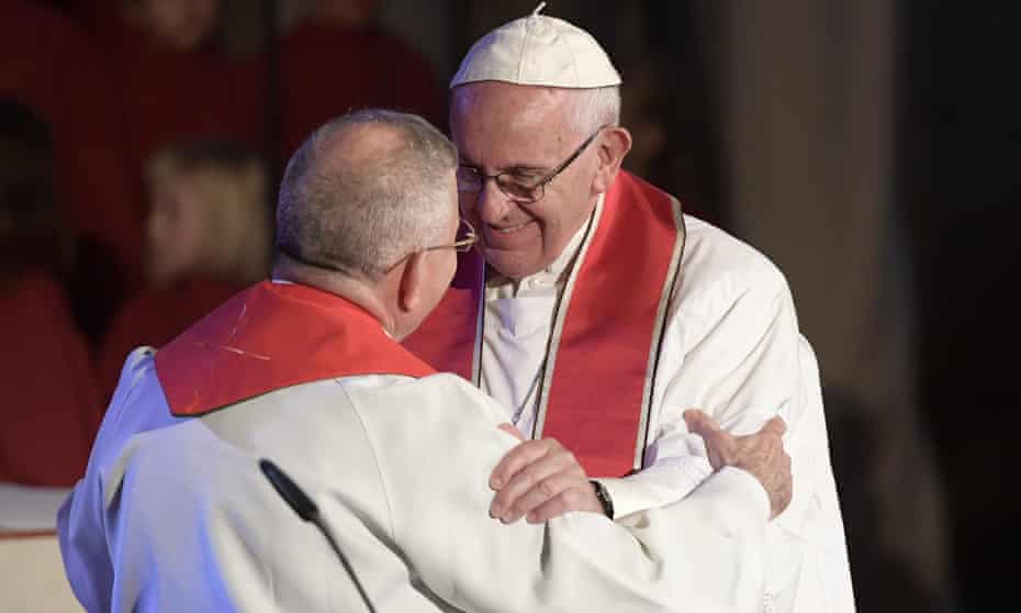 Pope Francis (R) greets Munib Younan, the president of the Lutheran World Federation.