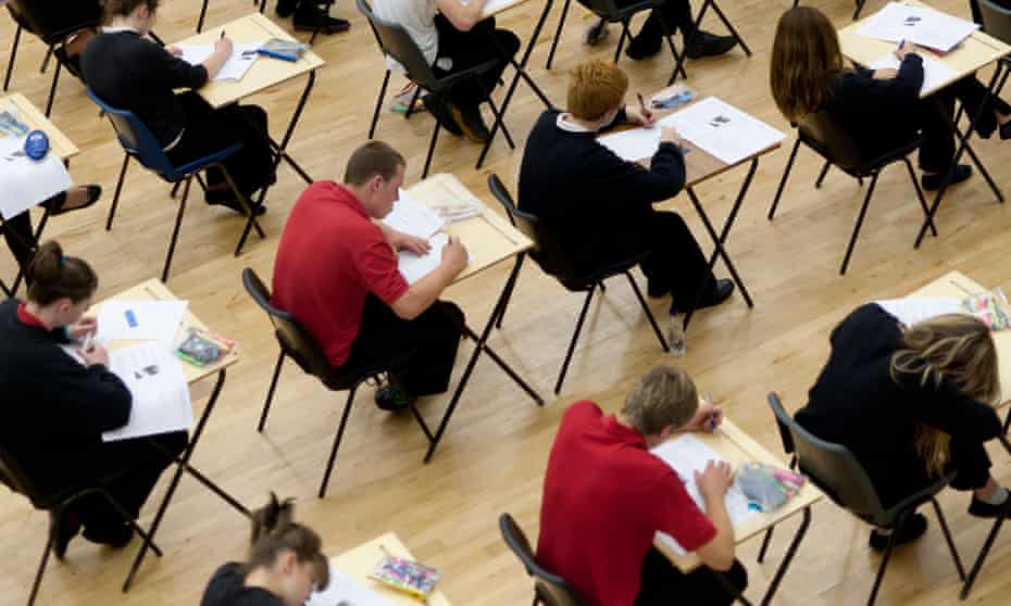 School students sitting their GCSE examinations, UK