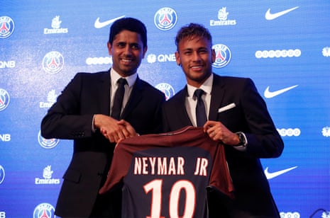 New Paris Saint-Germain signing Neymar Jr and Chairman and CEO Nasser Al-Khelaifi pose with Neymar’s club shirt.