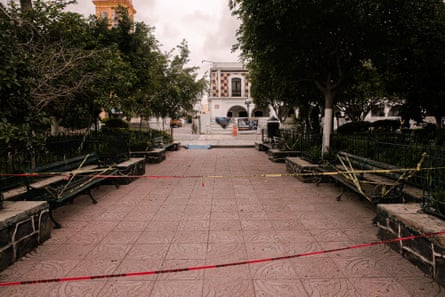 The main park in Izucar de Matamoros is taped off to prevent people gathering.