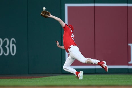 Republican senator Eric Schmitt made a diving catch during the third inning of the congressional baseball game on Wednesday in Washington DC.