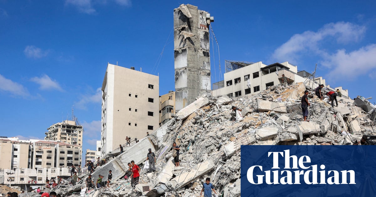 Israel destroys second Gaza high-rise as military kills another 56 Palestinians, including aid-seekers