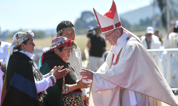 Pope Francis greets Mapuche people during a mass mass at Maquehue airport, near Temuco, Chile, on Wednesday.