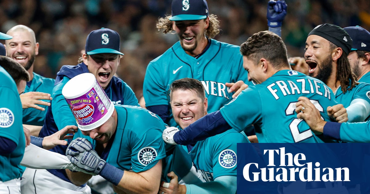 Cal Raleigh’s walk-off home run ends Seattle Mariners’ 21-year playoff drought – The Guardian