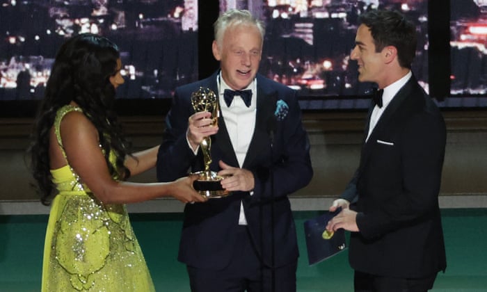 Mike White accepts the award for Best Writing in a Limited Series.