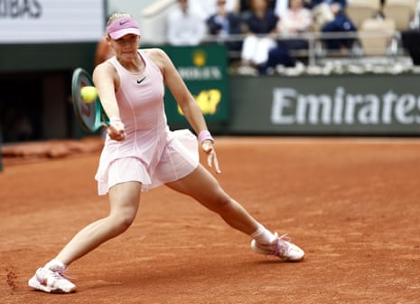 Mirra Andreeva flings a forehand to Maja Chwalinska from the baseline.