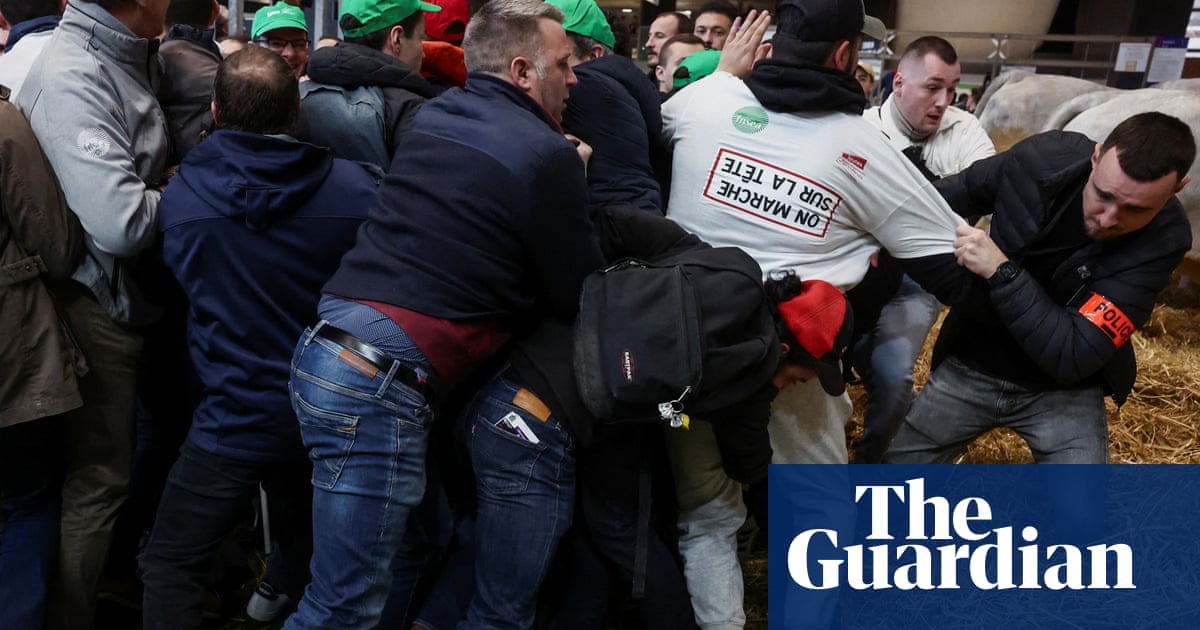 Angry French farmers storm into Paris agriculture fair