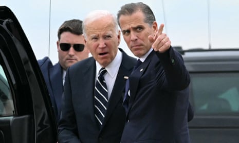 Joe Biden speaks to Hunter, who is pointing off screen.