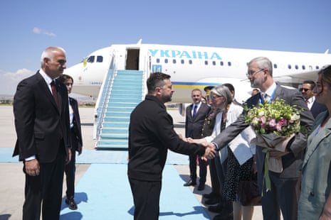 Ukrainian president Volodymyr Zelenskyy is welcomed by the Turkish culture minister Mehmet Nuri Ersoy at Esenboga Airport in Ankara, Turkey.