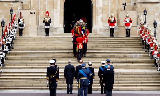 Pall bearers carry the coffin of Queen Elizabeth II into St. George’s Chapel.