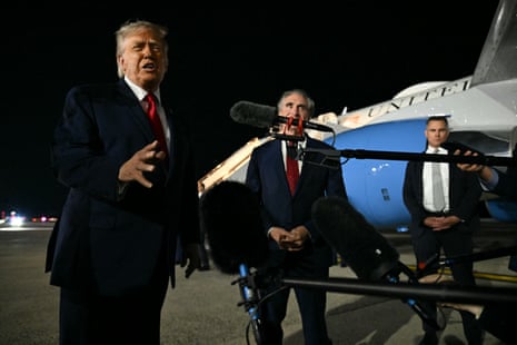 US President Donald Trump speaks to the press before boarding Air Force One prior to departure from JFK international airport in New York.