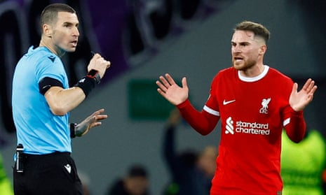 Liverpool's Alexis Mac Allister appeals to referee Georgi Kabakov as they wait for VAR decision before a goal scored by Liverpool's Jarell Quansah is disallowed.