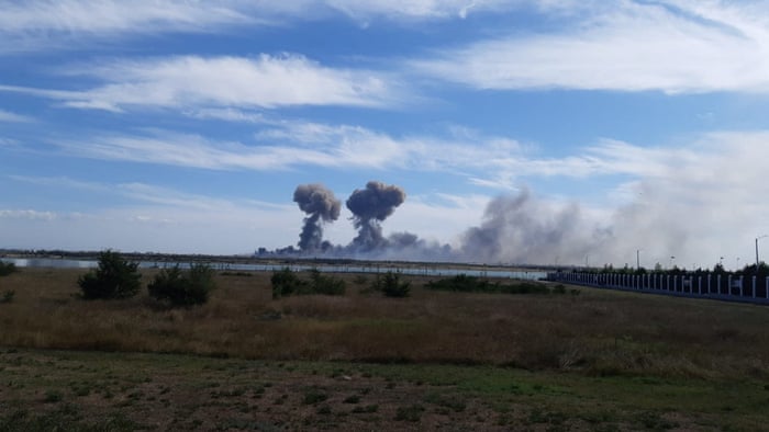 Smoke rises after explosions were heard near Novofedorivka.