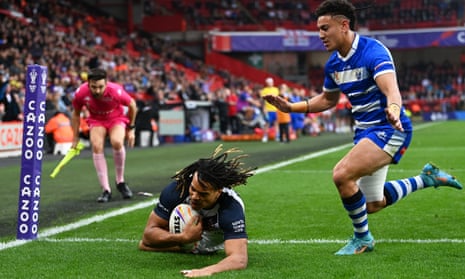 Dominic Young of England goes over to score his side’s second try.