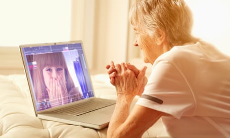 Older Caucasian woman video-chatting with granddaughter