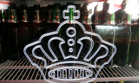 Bottles of Carlsberg beer are seen in fridge in a bar in St Petersburg