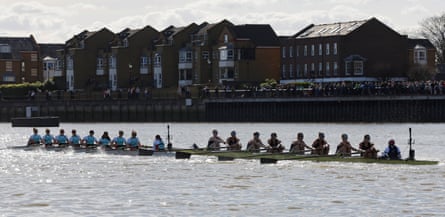 The Oxford and Cambridge women’s boats make contact. 