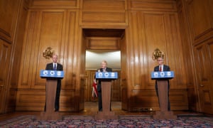Left to right: Chris Whitty, Boris Johnson and Patrick Vallance at the press conference.