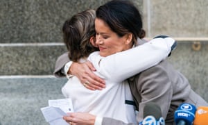 Tarale Wulff, right, hugs her lawyer Gloria Allred after the sentencing of Harvey Weinstein in New York on 11 March 2020
