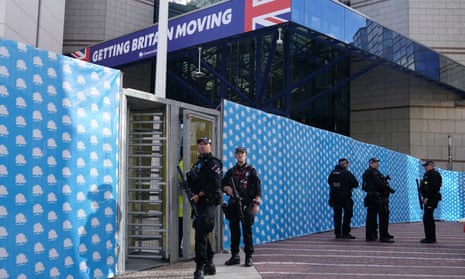 Armed police officers outside the International Convention Centre in Birmingham on Saturday ahead of the Conservative party annual conference.