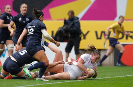 Kelsey Clifford of England scores her second try.