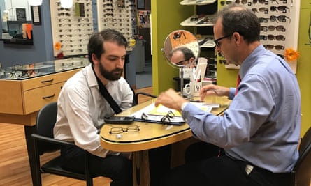 Ben Jacobs being fitted for new glasses with optician Russell Byron.