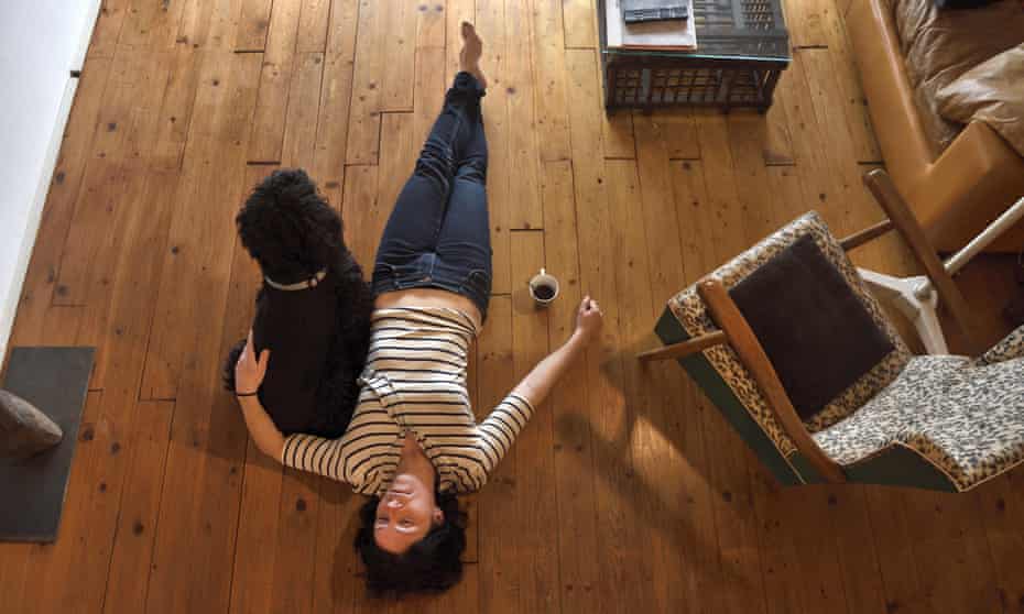 Woman lies on floor