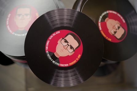 Illustration of. Burnham within a flyer shaped like a vinyl record