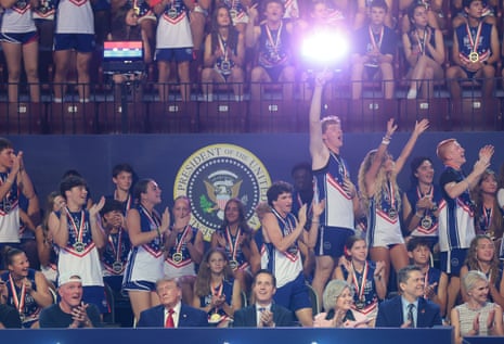 Pat McAfee alongside Donald Trump at the Patriot Games in Ohio in August. The ESPN star has emerged as one of the most prominent figures in a new generation of rightwing sports personalities aligned with the president.